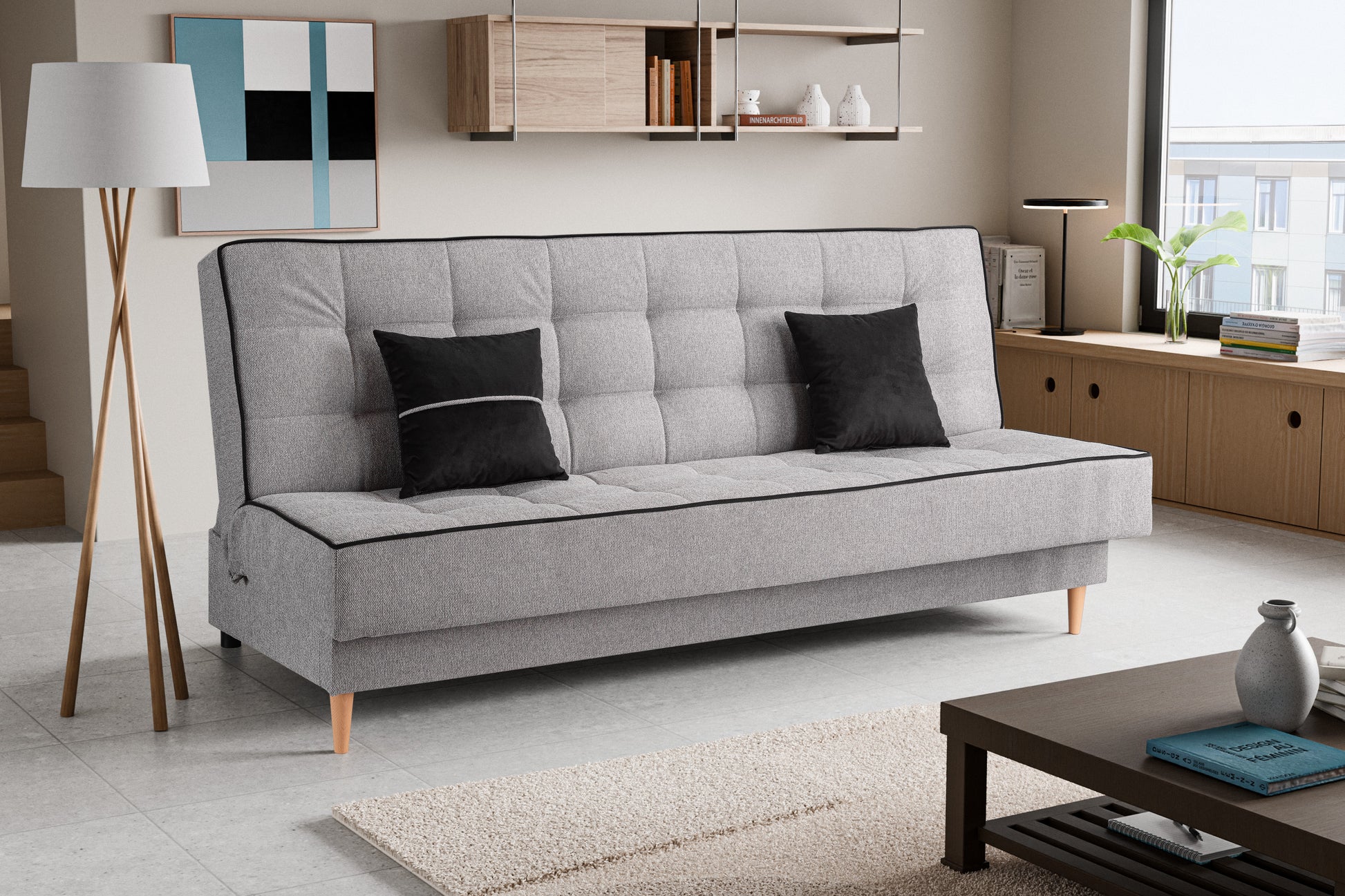 Schlafsofa mit Schlaffunktion, grauer Stoffbezug, zwei schwarze Kissen, Holzfüße