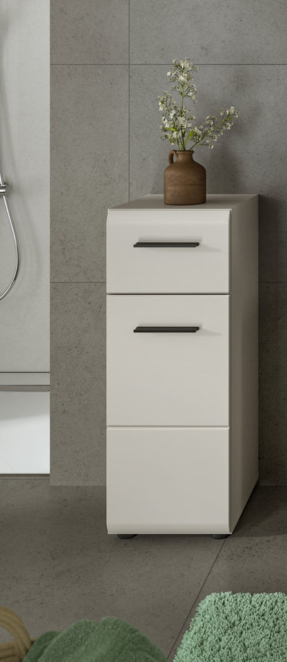 Schmaler Badezimmerschrank weiß mit zwei Schubladen und Griffleisten.