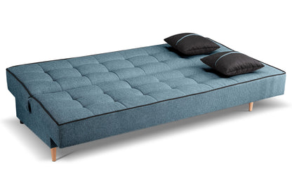 Schlafsofa aufgeklappt: blaue Matratzenoberfläche mit zwei dunklen Kissen