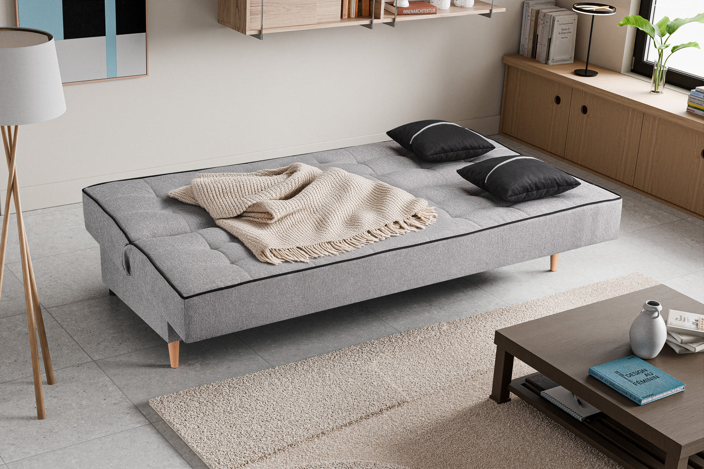 Schlafsofa mit Schlaffunktion, grauer Stoff, Bett ausgeklappt mit dunklen Kissen und Decke