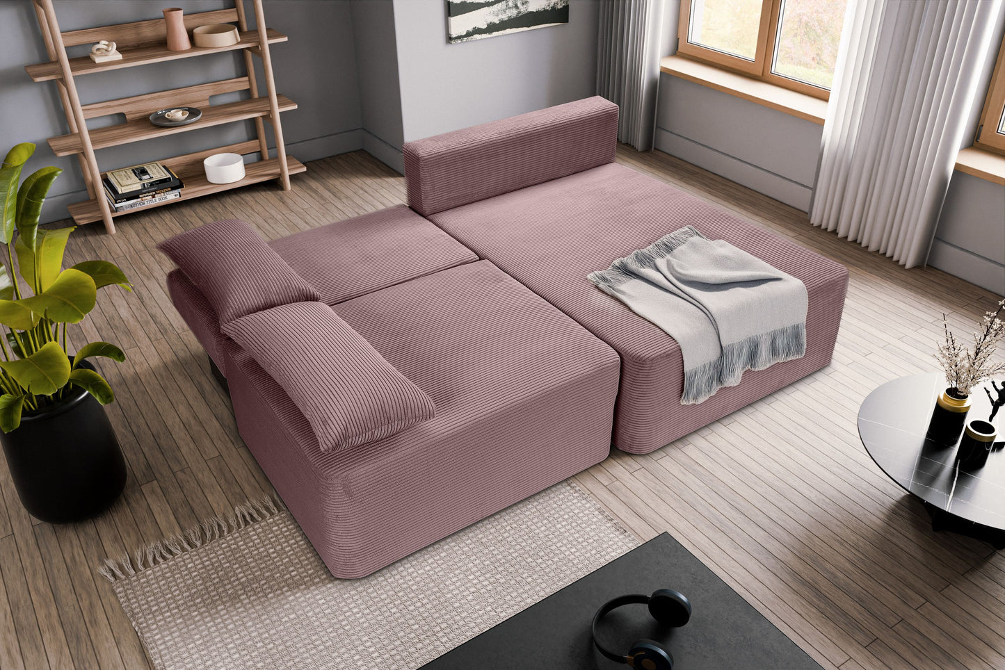 Schlafsofa in Altrosa mit Cordbezug, ausgeklappte Liegefläche und dekorative Kissen