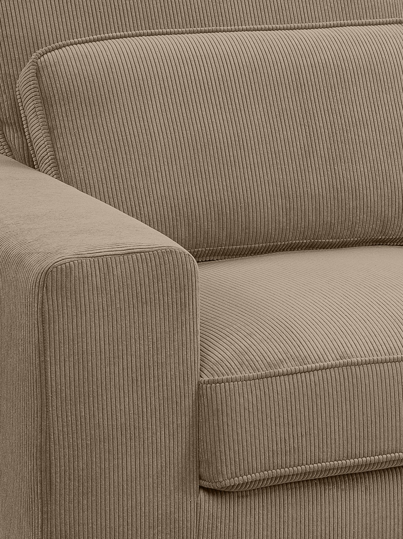 Detail von Sitzfläche und Rückenpolster: Cordstoff in Beige mit feinem Rippmuster und Naht