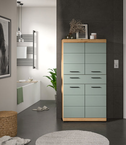 Badschrank mit Schubladen und Türen, graugrüne Front, Holzrahmen, offene Raumansicht