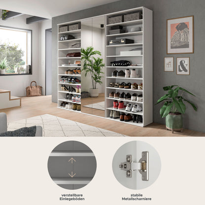 Garderoben-Systemschrank in Grau mit offenen Schuhfächern und zentraler Tür, stehend.