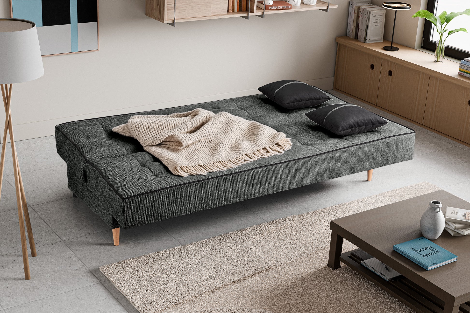 Schlafsofa mit Schlaffunktion, grauer Stoffbezug, ausgeklappte Liegefläche mit Kissen