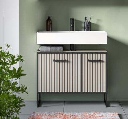 Waschbeckenunterschrank mit zwei Türen, geripptem Beige, dunklen Griffen und Kufen