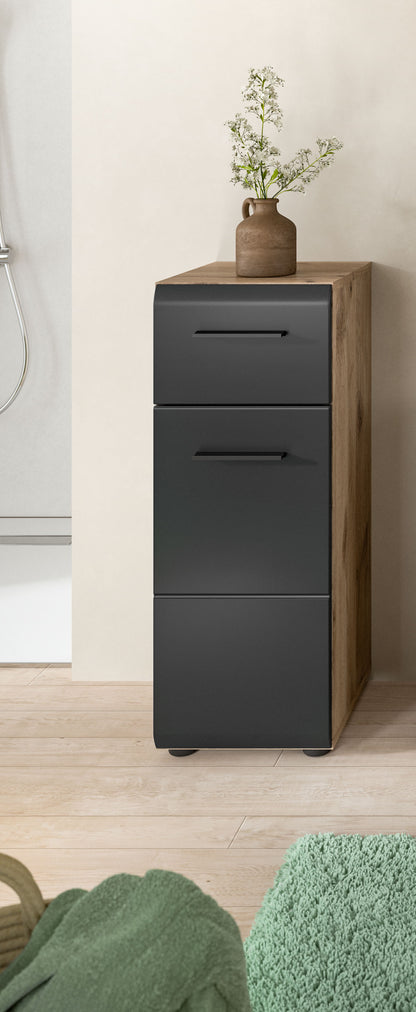Schmaler Badezimmerschrank dunkelgrau mit zwei Schubladen und Holzseiten.