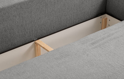 Schlafsofa Innenbereich mit Liegerahmen, grauer Bezug, Holzleisten sichtbar
