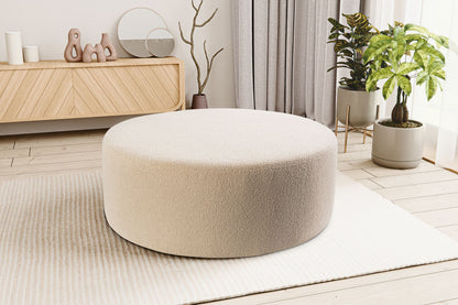 Runder Cord-Hocker mit weicher Polsterung, beige, seitlicher Blick auf den Zylinder