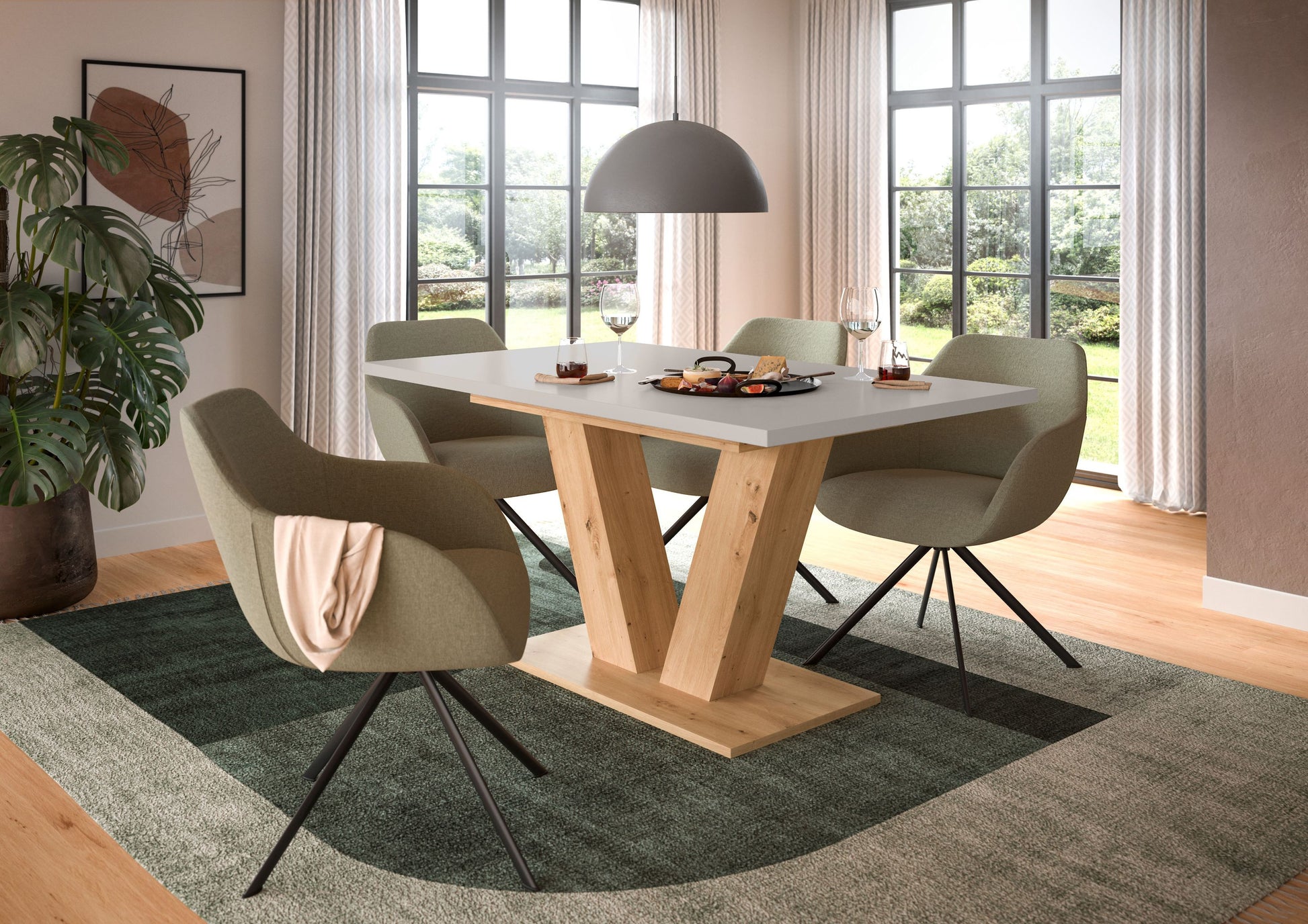Esstisch mit Holzplatte und X-Gestell aus hellem Holz, mit Stühlen im Esszimmer